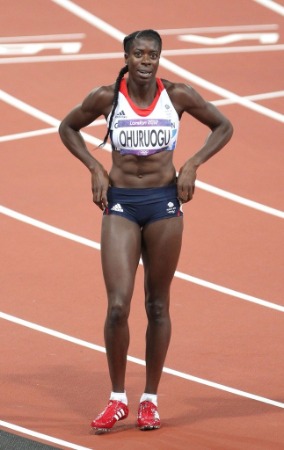 Christine Ohurougu in racing track showing her muscular body
